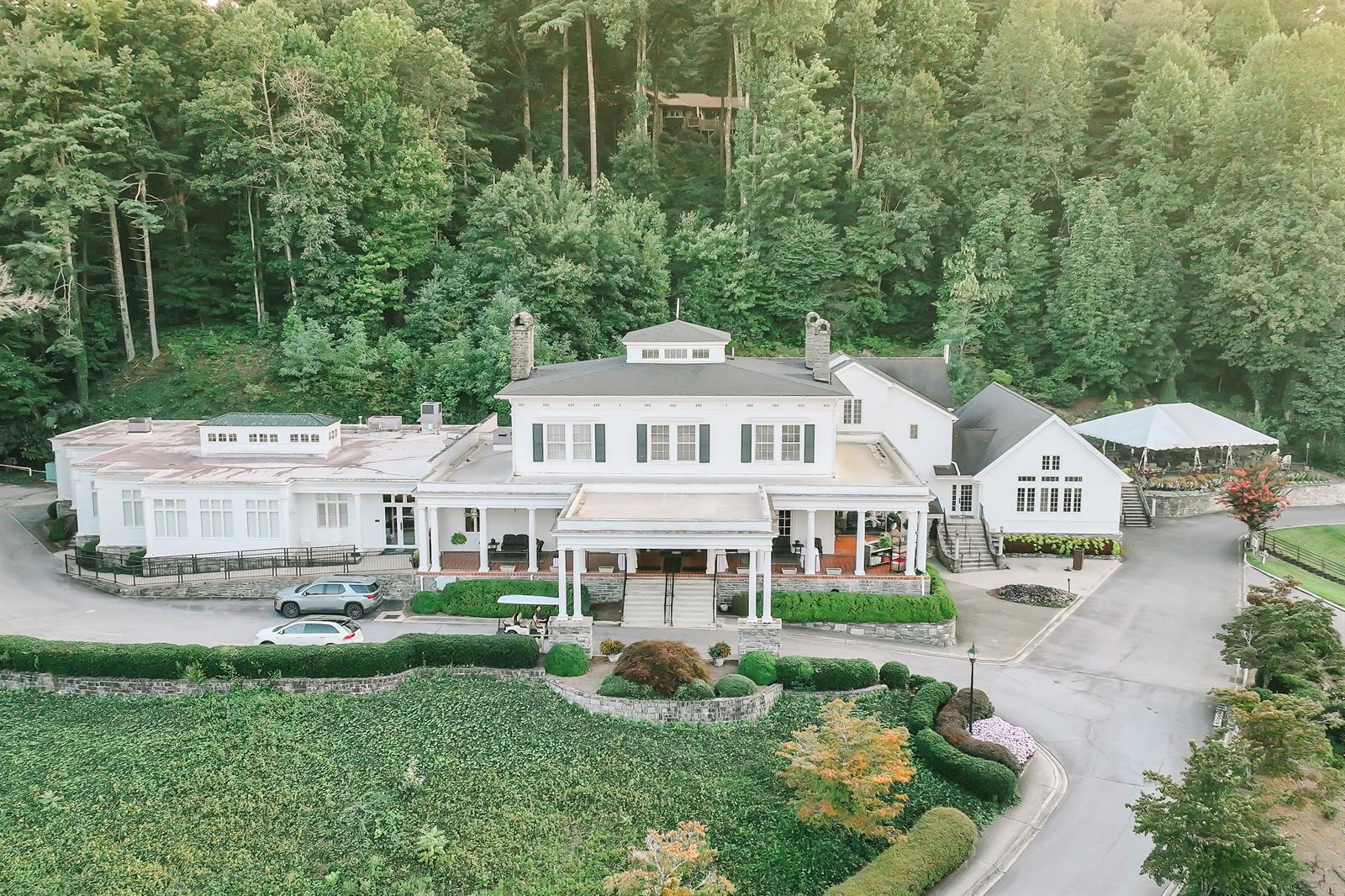 Charleston-inspired mansion at Kenmure, featuring event spaces and a stunning veranda.