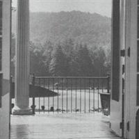 old sepia photo of the golf clubhouse entrance