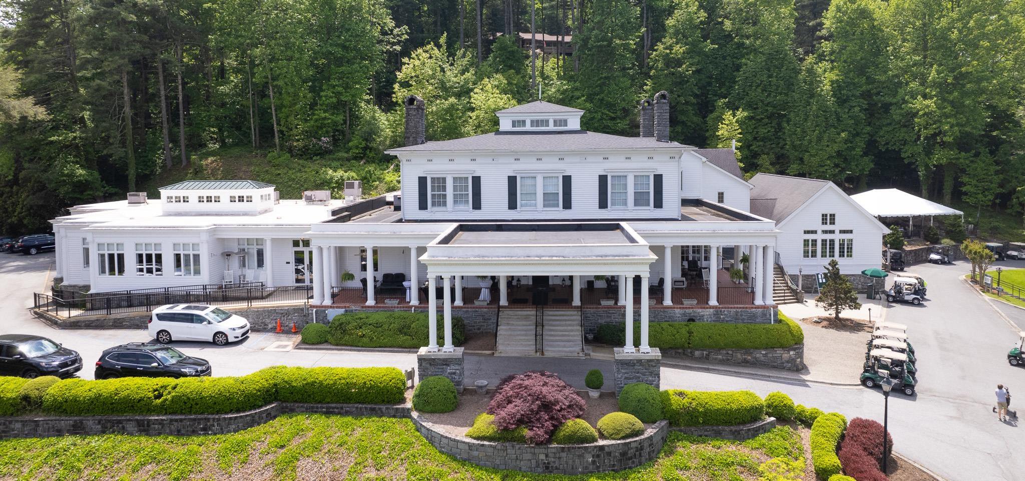 Charleston-inspired mansion at Kenmure, featuring event spaces and a stunning veranda.