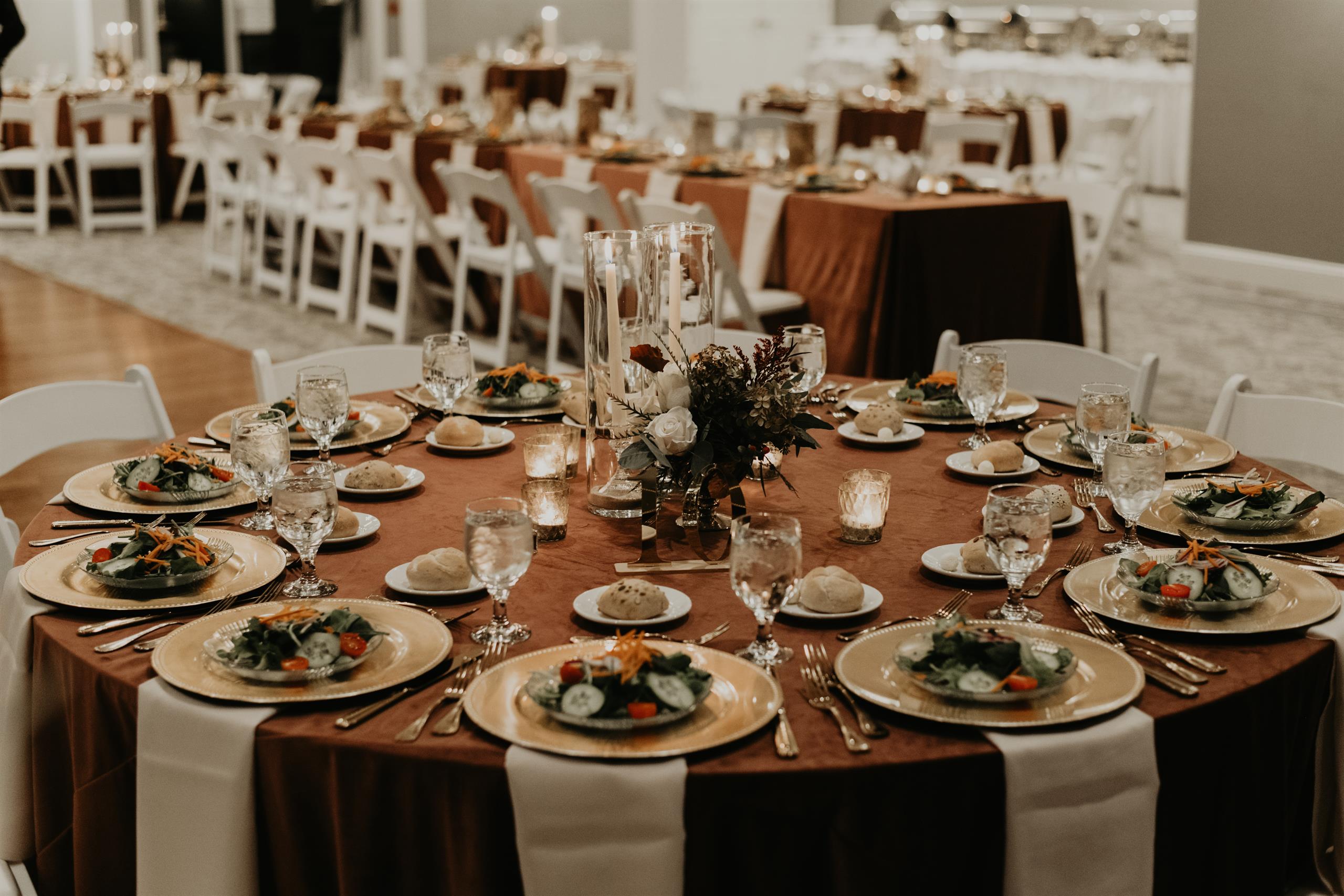 Elegant table set for a celebration, featuring premium decorations and exquisite dining arrangement