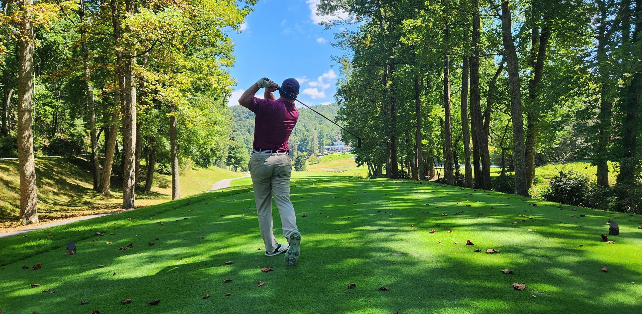 Person playing golf at Kenmure Country Club